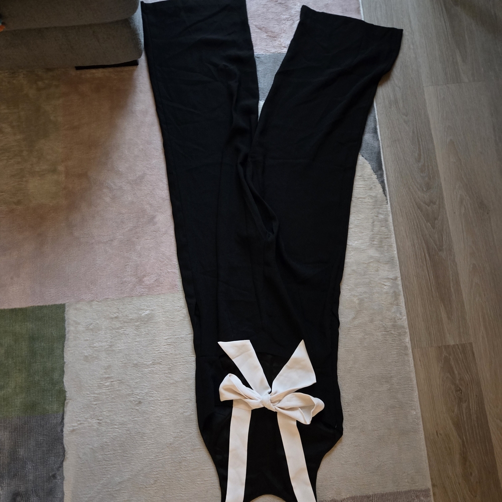 H&M Black Jumpsuit with White Bow Accent